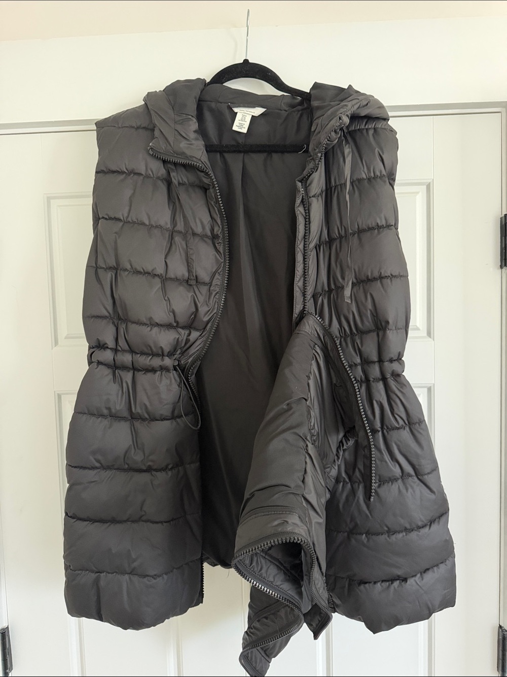 Baby wearing Puffer Vest with Hood with hood